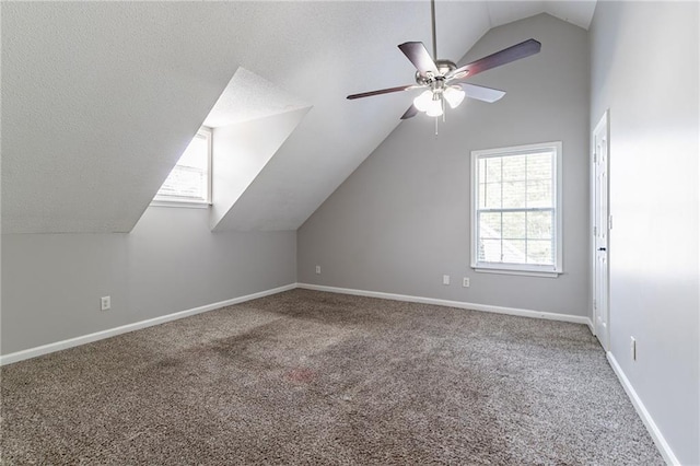 7384 Birch Hollow Pl, Douglasville, GA 30134 - bonus room with lofted ceiling, ceiling fan, carpet floors, plenty of natural light, and baseboards