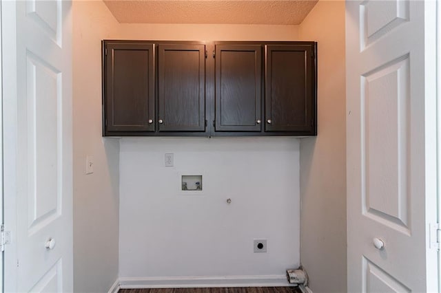 7384 Birch Hollow Pl, Douglasville, GA 30134 - washroom with electric dryer hookup, hookup for a washing machine, cabinet space, gas dryer hookup, and wood finished floors