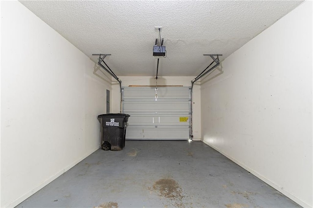 7384 Birch Hollow Pl, Douglasville, GA 30134 - garage featuring a garage door opener and baseboards