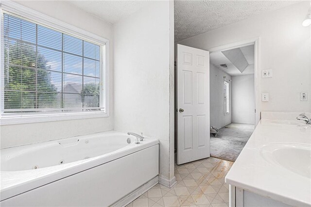 48 Savanna Ct, Powder Springs, GA 30127 - full bath featuring a whirlpool tub, double vanity, and tile patterned floors