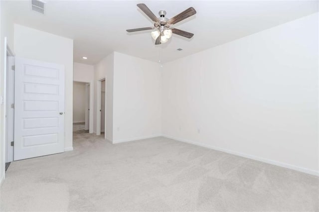 977 Daurian Dr, Statham, GA 30666 - empty room featuring light colored carpet, a ceiling fan, and recessed lighting