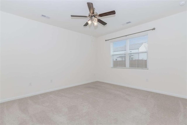 977 Daurian Dr, Statham, GA 30666 - spare room featuring light colored carpet and a ceiling fan