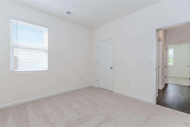 977 Daurian Dr, Statham, GA 30666 - carpeted spare room with baseboards