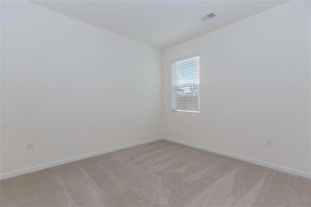 977 Daurian Dr, Statham, GA 30666 - empty room with light carpet and baseboards