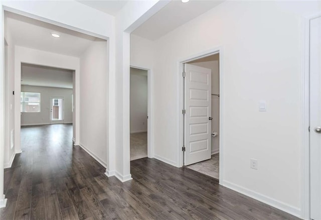 977 Daurian Dr, Statham, GA 30666 - hallway featuring dark wood-type flooring and recessed lighting