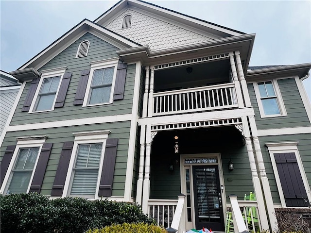 townhome / multi-family property featuring a balcony