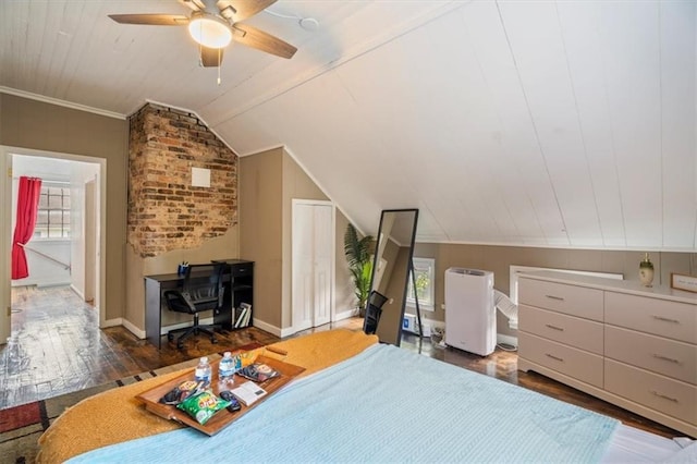 bedroom featuring ceiling fan, dark hardwood / wood-style flooring, and lofted ceiling