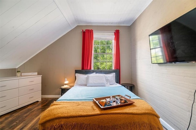 bedroom with dark wood-type flooring and vaulted ceiling