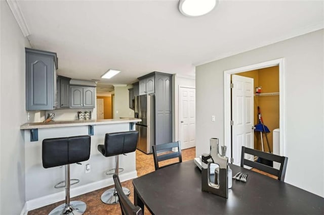 330 Pitts Chapel Rd, Newborn, GA 30056 - dining area with baseboards and ornamental molding