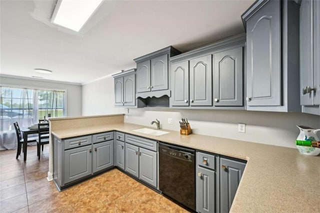 330 Pitts Chapel Rd, Newborn, GA 30056 - kitchen with a sink, light countertops, a peninsula, gray cabinetry, and black dishwasher
