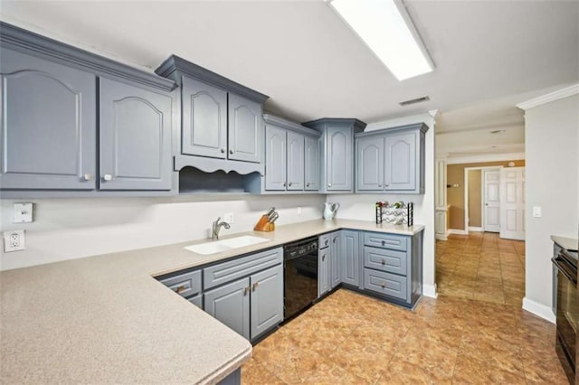 330 Pitts Chapel Rd, Newborn, GA 30056 - kitchen featuring light countertops, visible vents, a sink, gray cabinetry, and black appliances