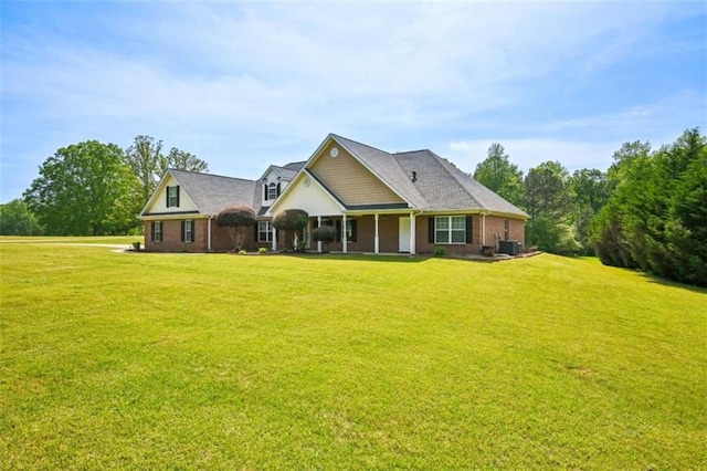 330 Pitts Chapel Rd, Newborn, GA 30056 - view of front of house featuring a porch, a front yard, and central AC