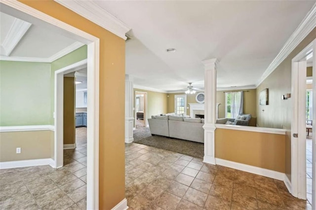 330 Pitts Chapel Rd, Newborn, GA 30056 - interior space featuring ornamental molding, baseboards, a ceiling fan, and a fireplace