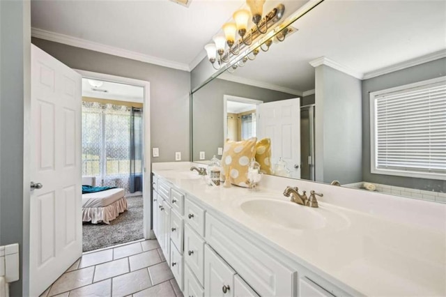 330 Pitts Chapel Rd, Newborn, GA 30056 - full bath with tile patterned floors, double vanity, connected bathroom, a sink, and crown molding