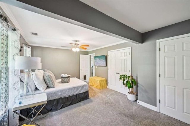 330 Pitts Chapel Rd, Newborn, GA 30056 - carpeted bedroom featuring a ceiling fan, a closet, baseboards, ornamental molding, and visible vents