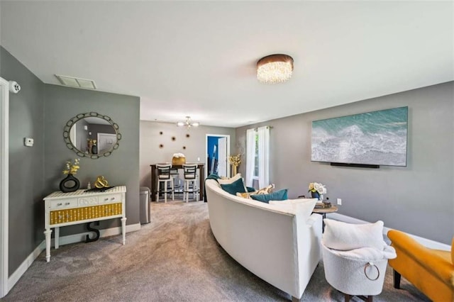 330 Pitts Chapel Rd, Newborn, GA 30056 - carpeted living room featuring visible vents and a notable chandelier