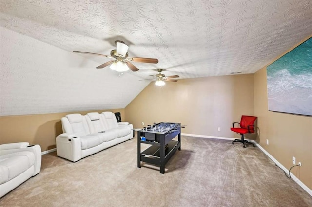 330 Pitts Chapel Rd, Newborn, GA 30056 - living area with a ceiling fan, a textured ceiling, carpet floors, baseboards, and lofted ceiling