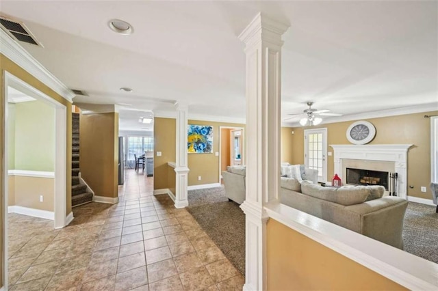 330 Pitts Chapel Rd, Newborn, GA 30056 - living area with baseboards, a ceiling fan, crown molding, and ornate columns
