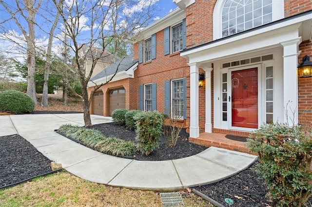 doorway to property featuring a garage