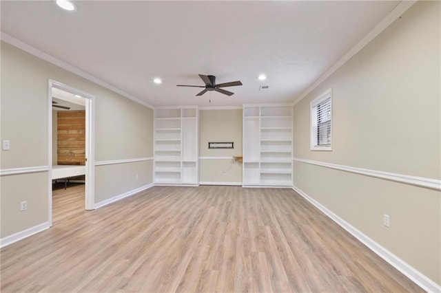 unfurnished living room with light wood-type flooring, built in features, ceiling fan, and crown molding