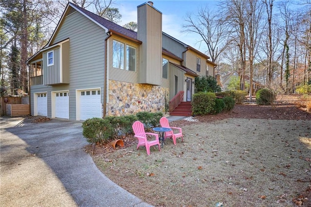 view of property exterior featuring a garage