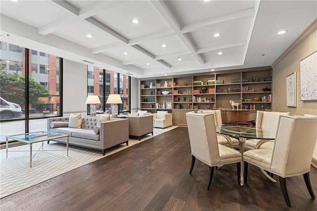 dining area with hardwood / wood-style flooring, coffered ceiling, and beamed ceiling