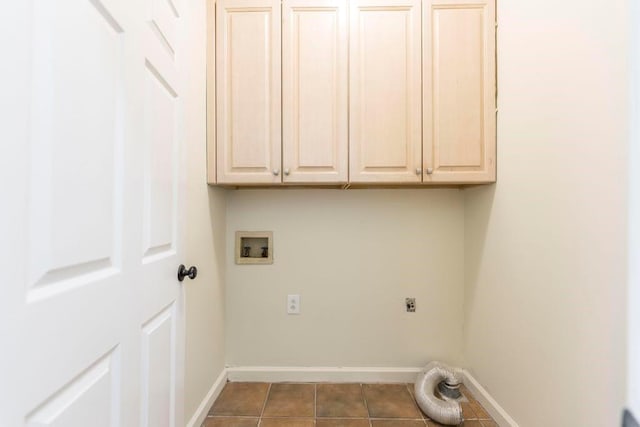 100 Bentwood Cir, Macon, GA 31210 - laundry area featuring hookup for an electric dryer, hookup for a washing machine, cabinet space, baseboards, and tile patterned floors