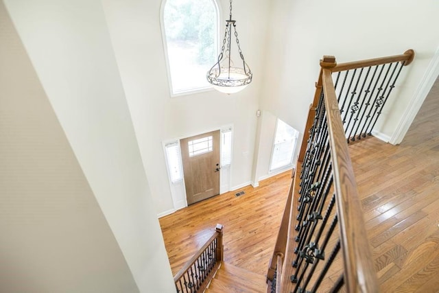 100 Bentwood Cir, Macon, GA 31210 - foyer with a towering ceiling, light wood-style floors, and baseboards