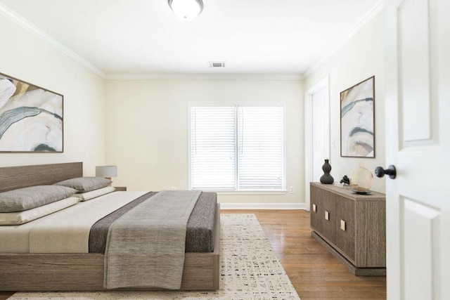 100 Bentwood Cir, Macon, GA 31210 - bedroom featuring ornamental molding, wood finished floors, and baseboards