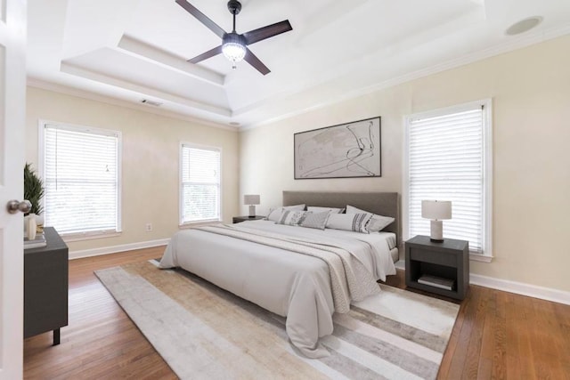 100 Bentwood Cir, Macon, GA 31210 - bedroom featuring a raised ceiling, ornamental molding, wood finished floors, baseboards, and ceiling fan