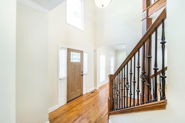 100 Bentwood Cir, Macon, GA 31210 - foyer entrance with crown molding, wood finished floors, baseboards, and a towering ceiling