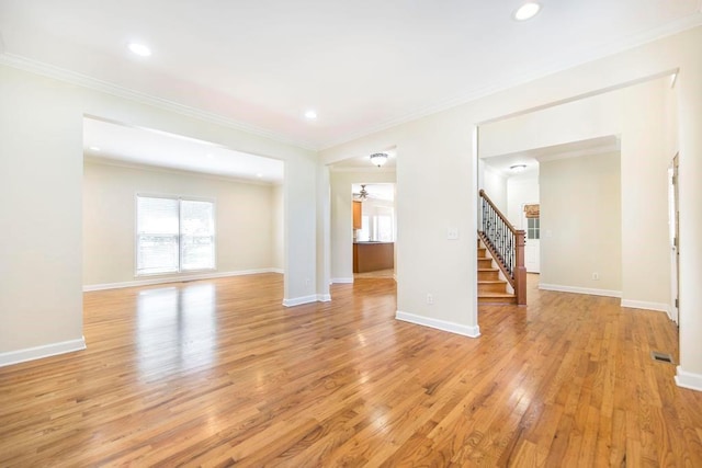100 Bentwood Cir, Macon, GA 31210 - unfurnished living room featuring stairs, ornamental molding, light wood-style floors, recessed lighting, and baseboards