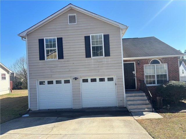 view of front facade featuring roof with shingles, concrete driveway, and an attached garage