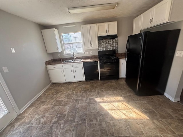 kitchen featuring under cabinet range hood, white cabinetry, black appliances, and a sink