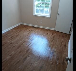 522 Jackson St, Rockmart, GA 30153 - spare room with wood finished floors and baseboards