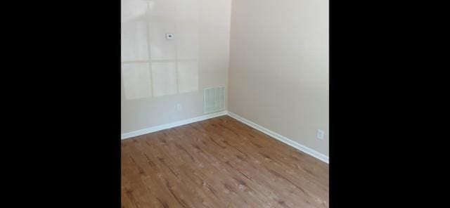 522 Jackson St, Rockmart, GA 30153 - unfurnished room featuring wood finished floors and baseboards