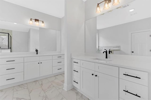 bathroom featuring vanity and walk in shower