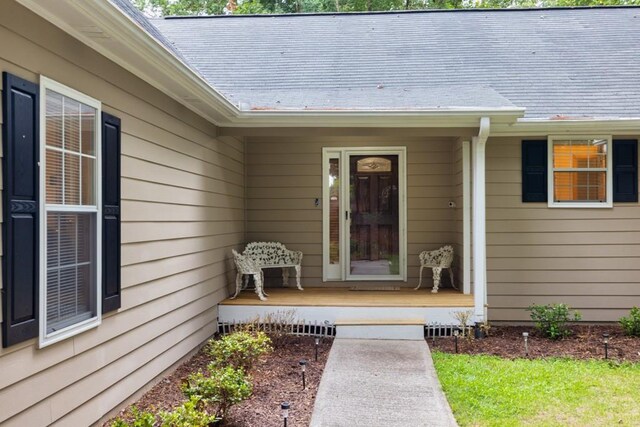 entrance to property with a porch