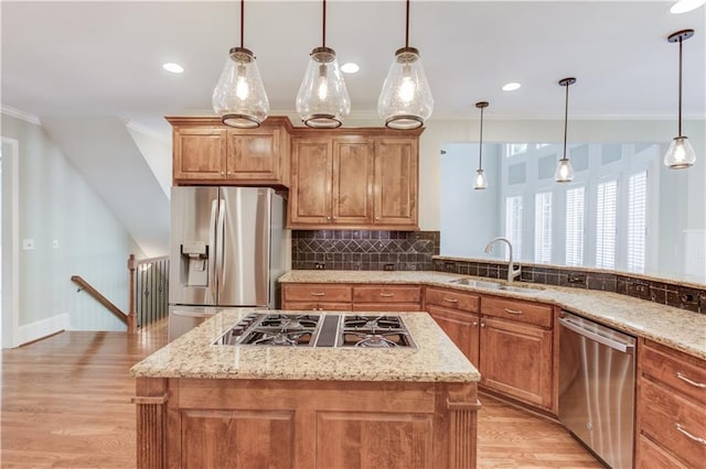 2748 Hidden Falls Dr, Buford, GA 30519 - kitchen with stainless steel appliances, ornamental molding, light stone counters, decorative backsplash, and brown cabinetry