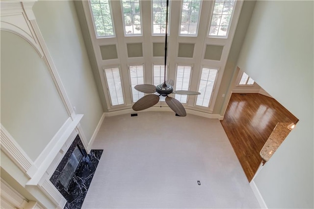 2748 Hidden Falls Dr, Buford, GA 30519 - detailed view of a premium fireplace and a ceiling fan