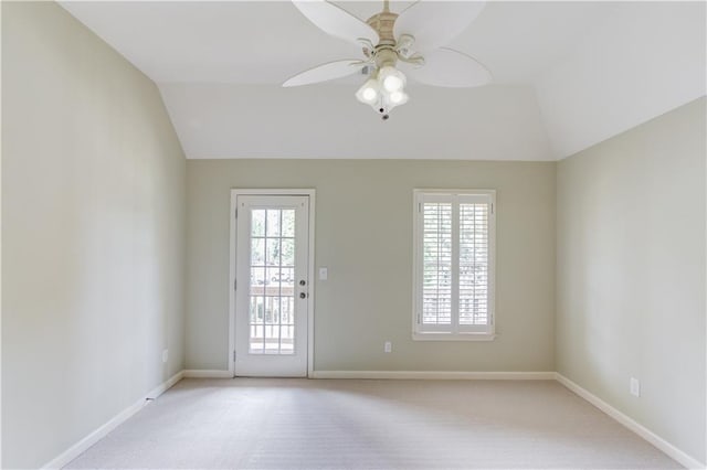 2748 Hidden Falls Dr, Buford, GA 30519 - spare room featuring a ceiling fan, healthy amount of natural light, lofted ceiling, and light carpet