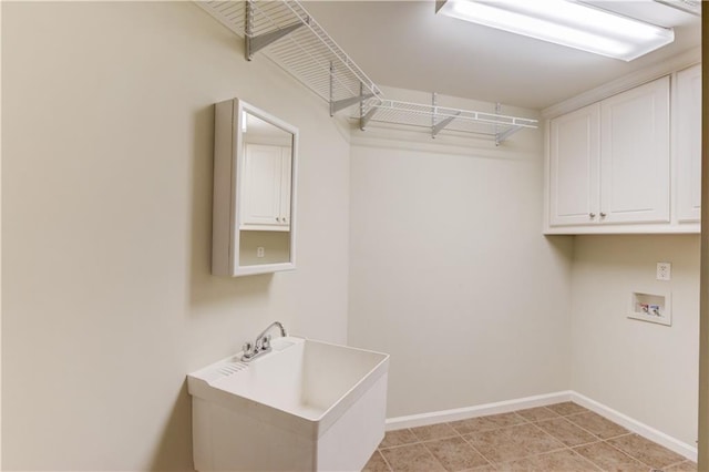 2748 Hidden Falls Dr, Buford, GA 30519 - laundry area featuring washer hookup and cabinet space