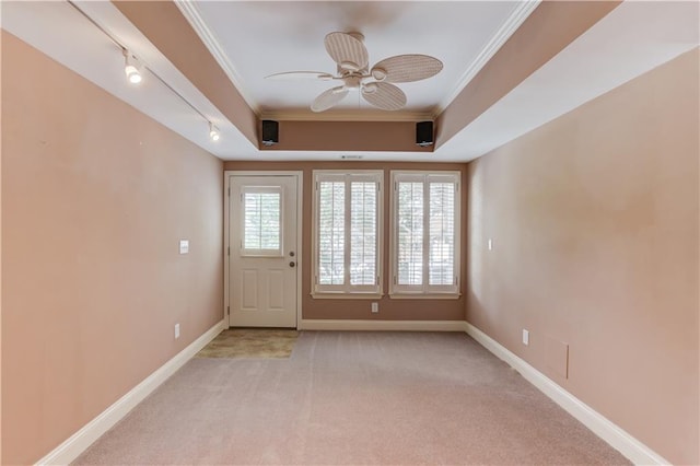 2748 Hidden Falls Dr, Buford, GA 30519 - entryway featuring ornamental molding, light carpet, ceiling fan, and rail lighting