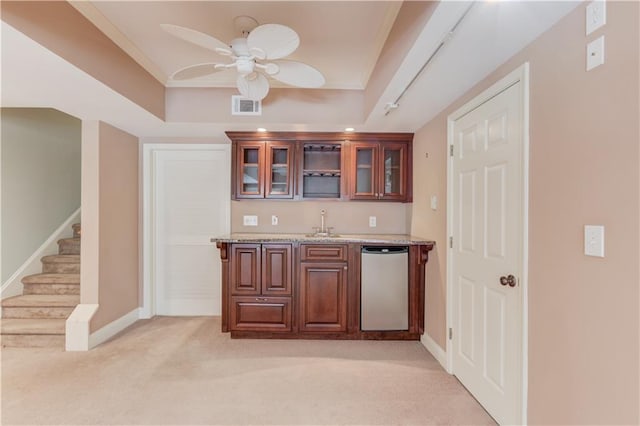 2748 Hidden Falls Dr, Buford, GA 30519 - indoor wet bar with light colored carpet, dishwasher, stairs, and ceiling fan