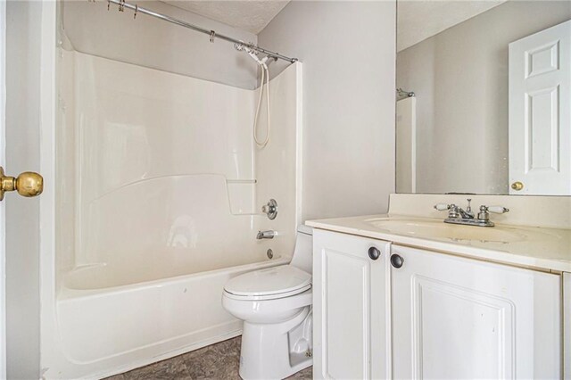 full bathroom featuring toilet, vanity, and bathing tub / shower combination