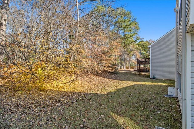 view of yard with a deck