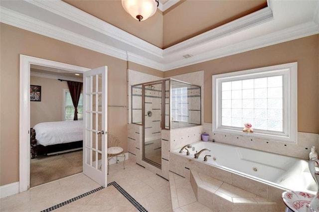 ensuite bathroom featuring a tub with jets, connected bathroom, tile patterned floors, a stall shower, and crown molding