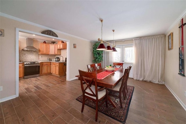 dining room with crown molding, dark wood-style floors, french doors, and baseboards