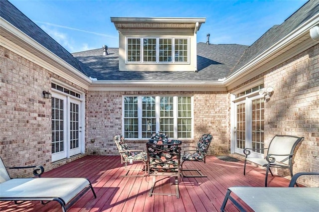 deck with outdoor dining space