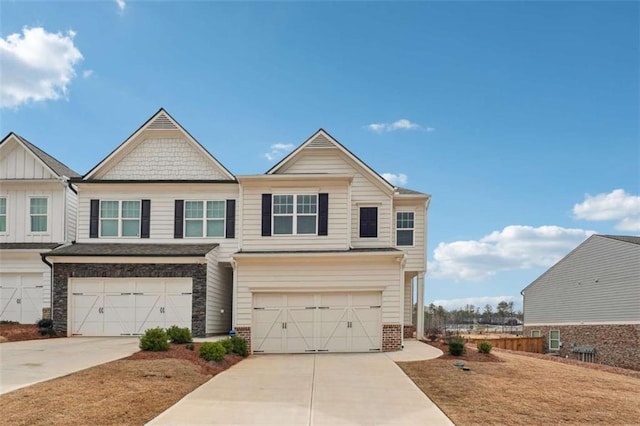 view of front of house featuring a garage, concrete driveway, and brick siding